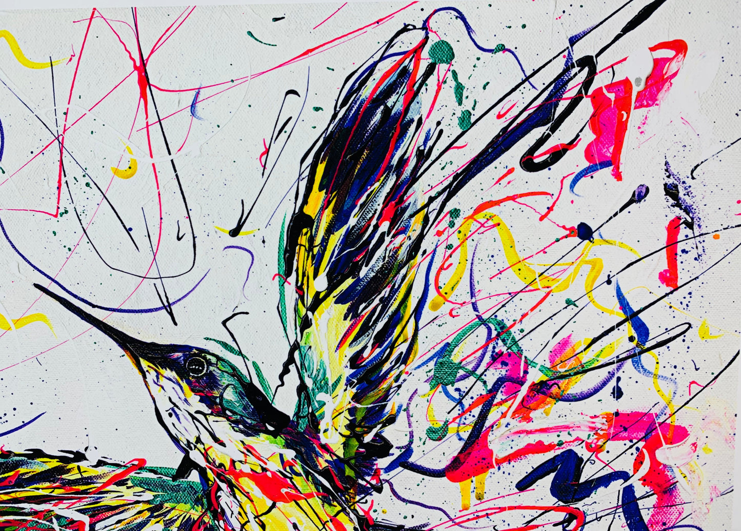 close up of a wing and head/body of the hummingbird with bright pink and iridescent green splashes demonstrating the high quality and viivid colours on this giclée print