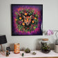 Framed artwork with vibrant wreath and leopards head in centre
