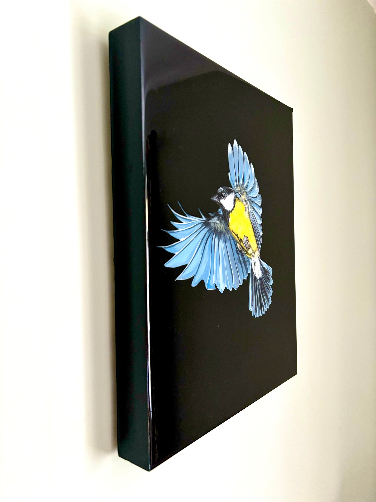 side angle view of resin art of great tit