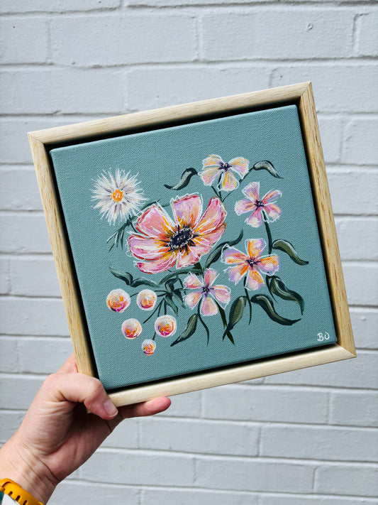Soft peach and pink flowers on a sage green mini canvas with a pine floating frame. Original artwork Letchworth Hitchin affordable art. 