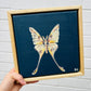 A soft creamy transparent rustic butterfly on a dark blue canvas in a pine floater frame. Rustic, chic, charm, country cottage decor. Hitchin Letchworth artist. Afforable original art. 