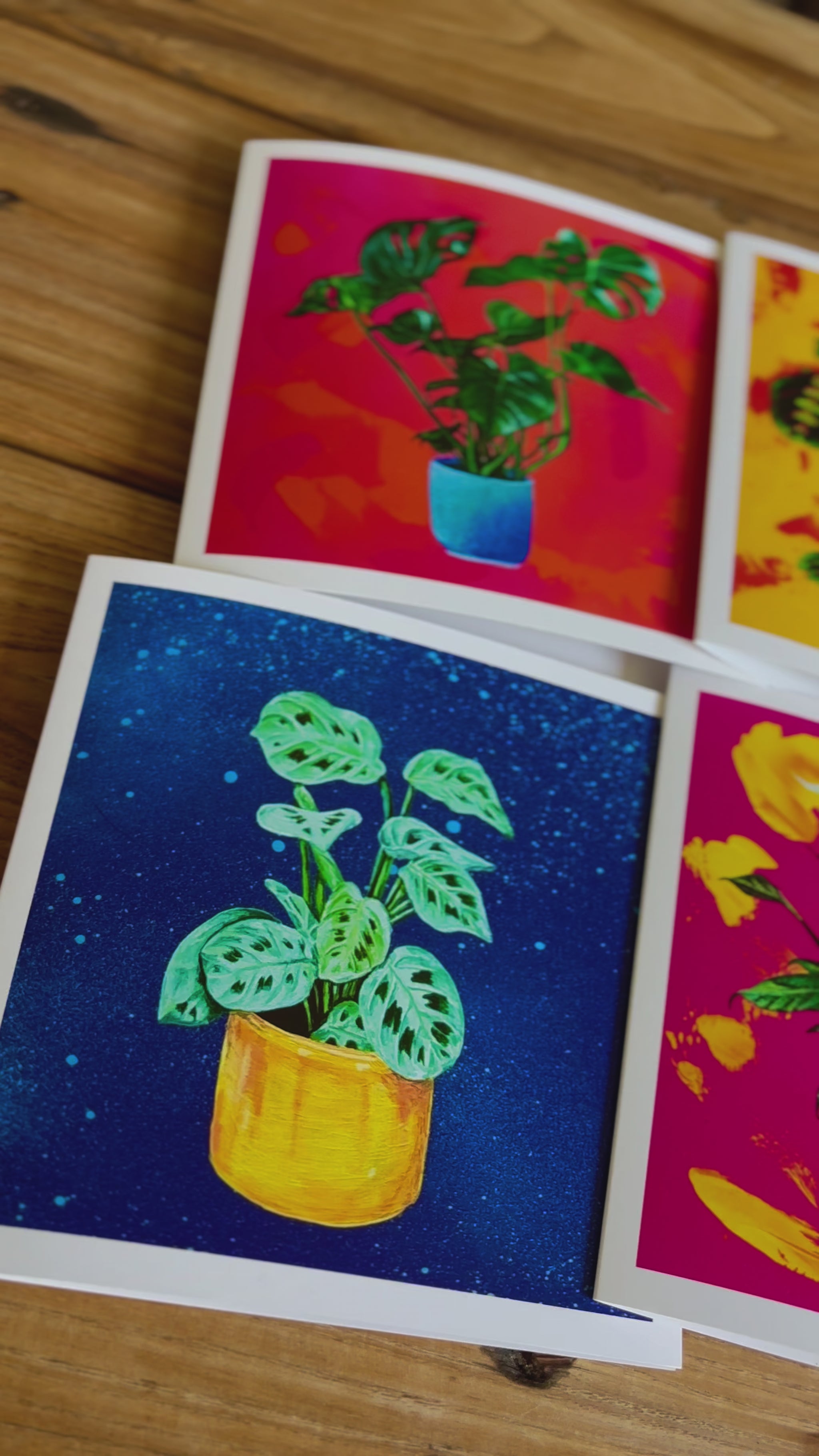Video of the six houseplant greeting cards on a table