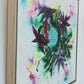 video of mixed media artwork of breast with yew and castor oil plants growing out