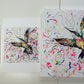 A4 (20.5 x 20.5cm), A3 (27.5 x 27.5cm) prints of hummingbird ("Explosion") next to the original which is size 50 x 50cm.