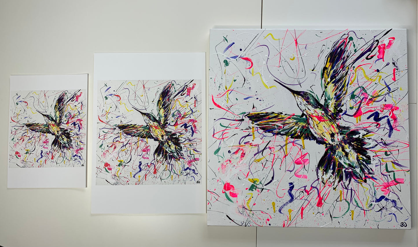 A4 (20.5 x 20.5cm), A3 (27.5 x 27.5cm) prints of hummingbird ("Explosion") next to the original which is size 50 x 50cm.